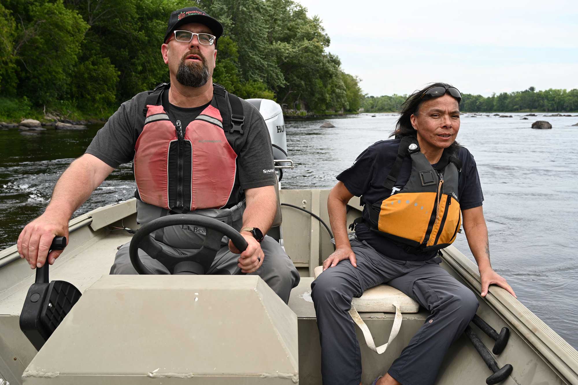 Penobscot Indian nation staff in boat